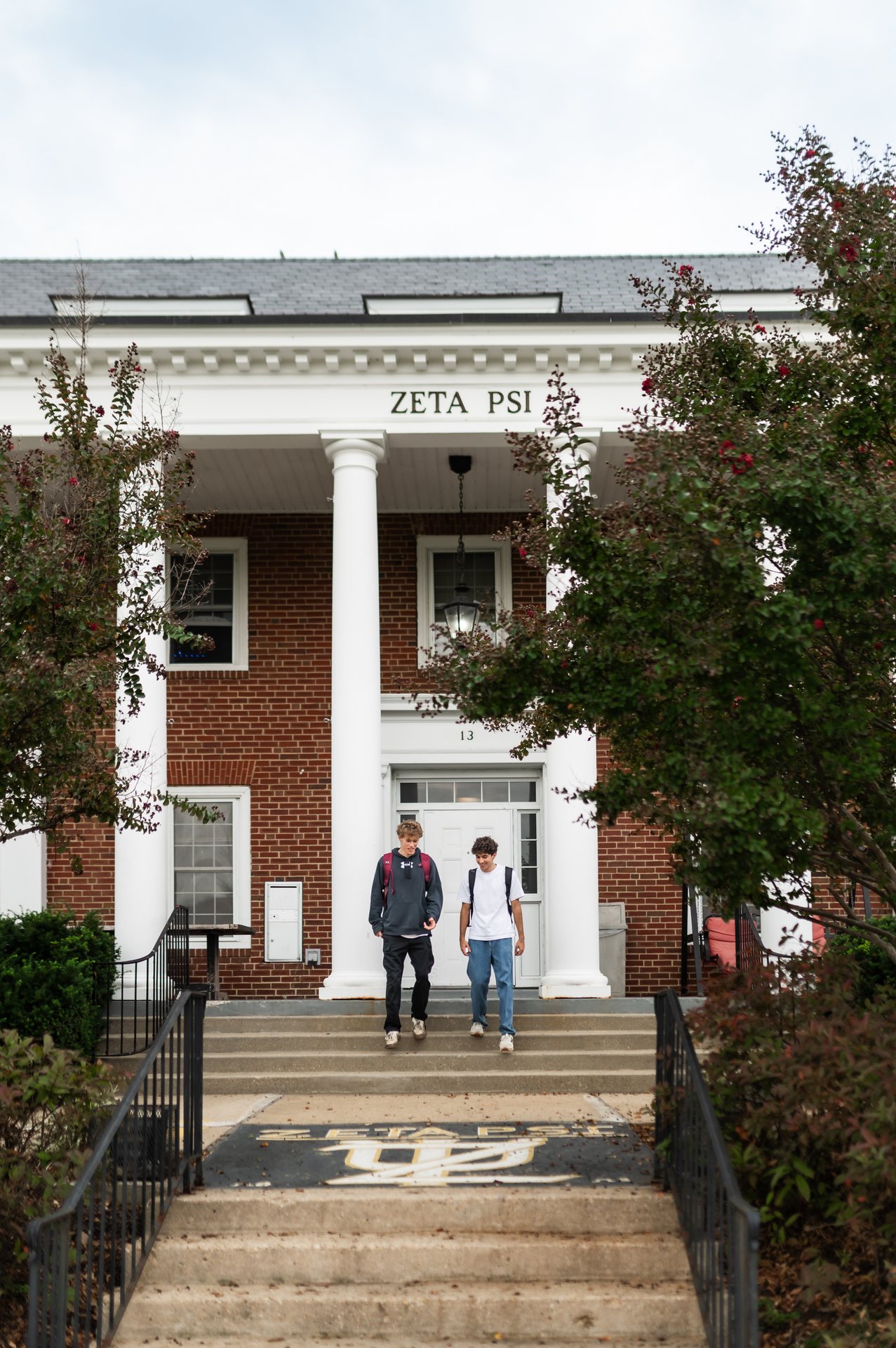 students walking on campus near landmark college park