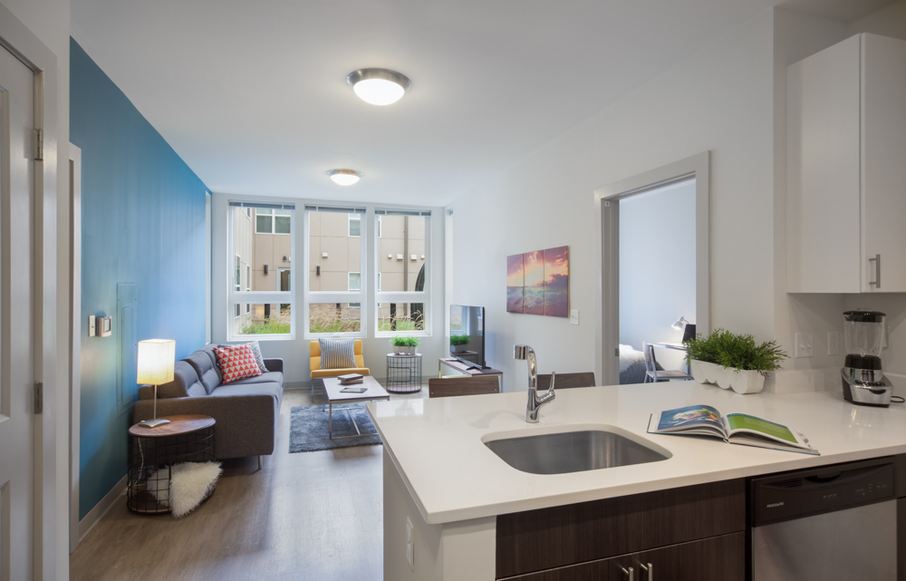Landmark’s units feature fully furnished living areas with plenty of natural light and views of the courtyard or the neighborhood. aerial premium