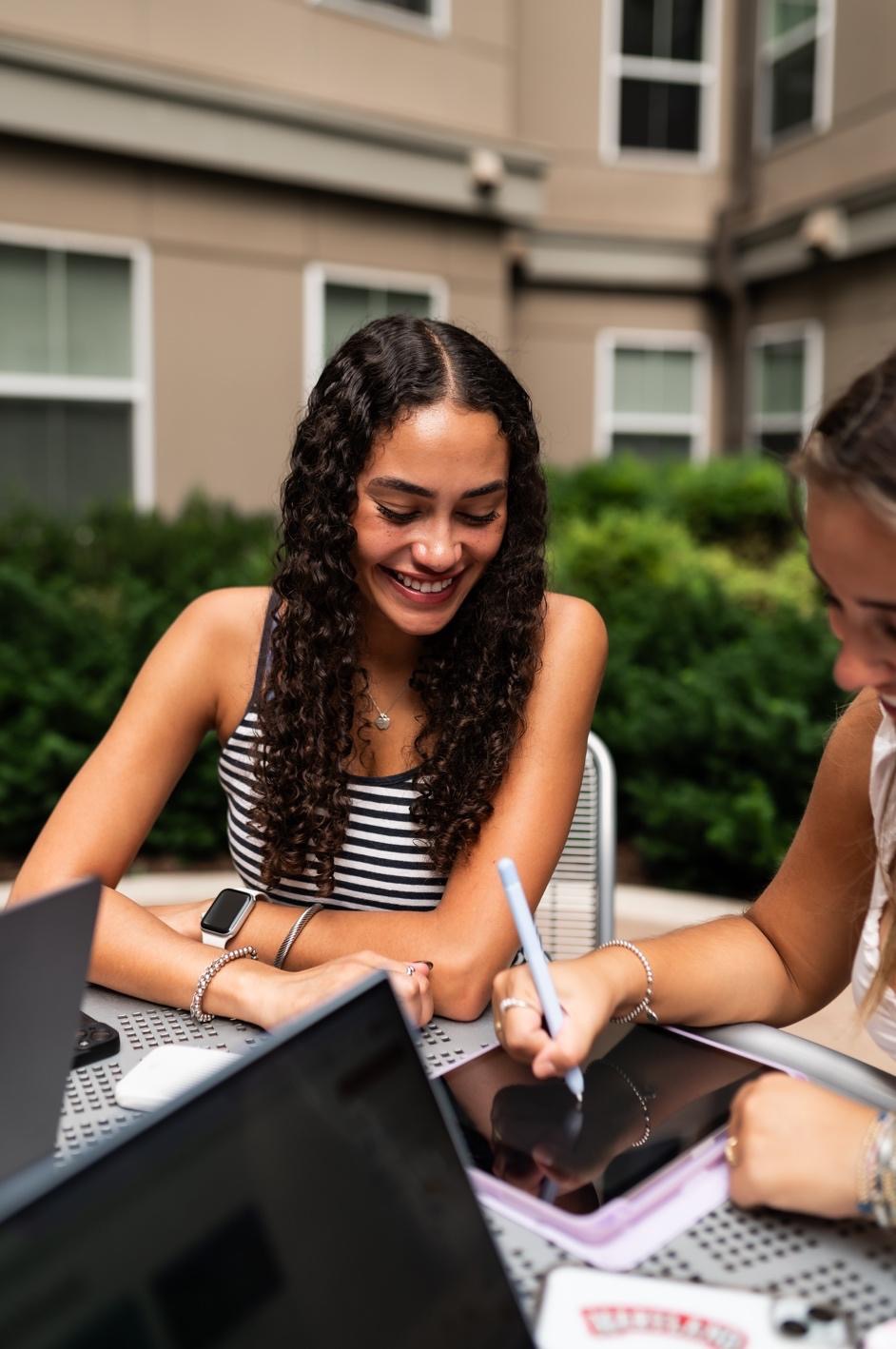 Student studying off-campus apartments near UMD. 